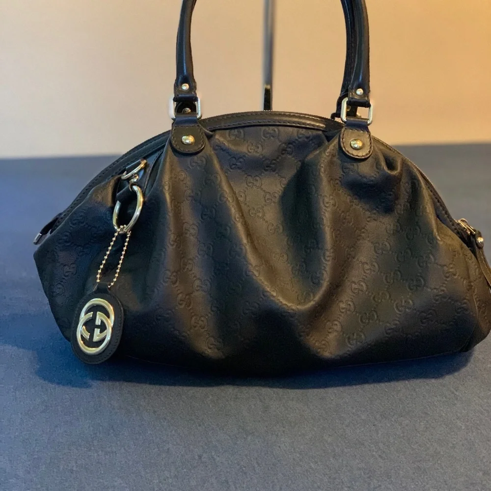 Gucci Black Embossed GG Shoulder Bag with Logo Charm
